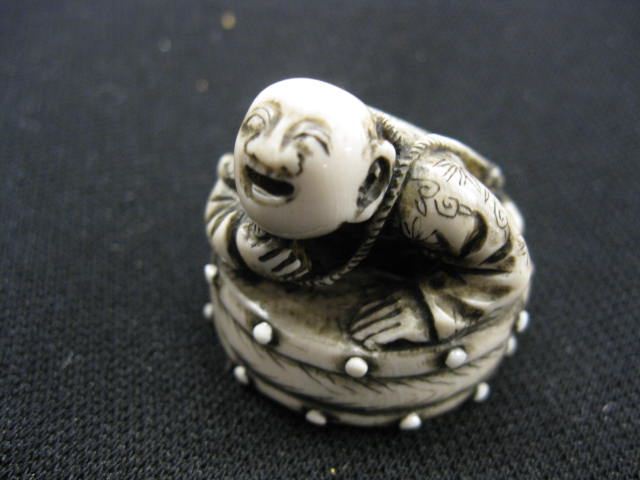 Carved Ivory Netsuke of Mantied