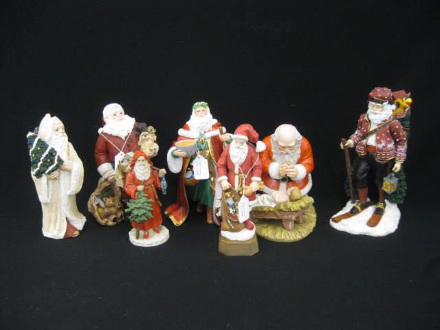 7 Santa Figurines various pose