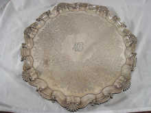 A large engraved silver salver 14bbe9