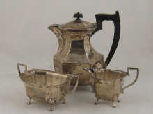A three piece silver coffee set of pot