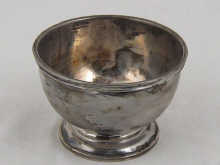 A silver hemispherical bowl 8 cm