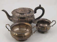 A three piece silver tea set by