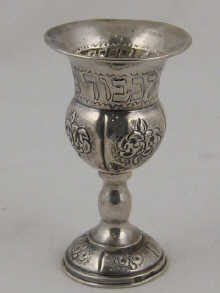 A white metal (tests silver) kiddush