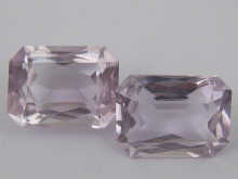 A pair of loose polished rose quartz 14bc31
