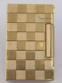 A 9 ct gold gent's petrol lighter