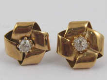 A pair of 9 ct gold earrings in the