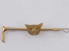 A 9ct gold bar brooch in the form 14bc5e
