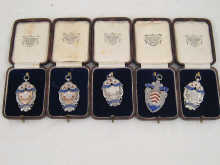 A collection of five silver enamel 14bc75