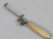 An early 19th c. steel dental saw with