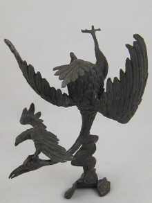 A Chinese bronze group of a phoenix