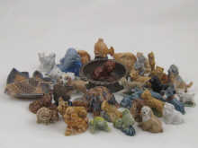 About seventy Wade Whimsies including