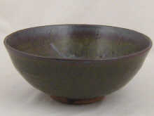 A ceramic stoneware bowl with heavy 14bcba