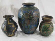 Three ceramic vases with floral