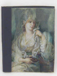 A miniature on ivory of a lady holding