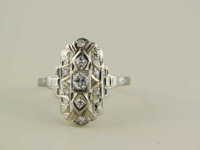 Diamond Ring 9 round diamonds totaling