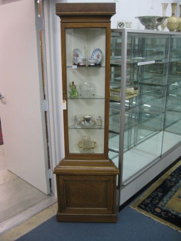 Corner Cabinet glass shelves lower compartment.