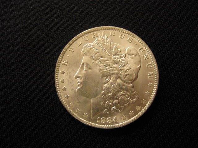 1884-O Morgan Silver Dollar gem uncirculated.