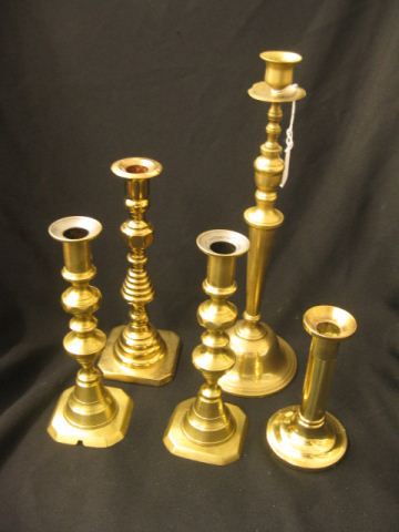 5 Brass Candlesticks one a beehive pair