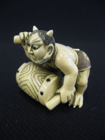 Carved Ivory Netsuke of an Oni 14c062