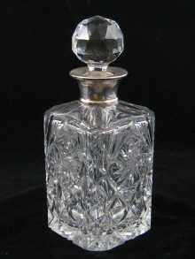 A silver mounted cut glass decanter 149af3