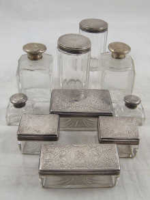 A group of ten cut glass dressing table