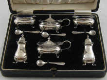 A boxed silver double cruet set