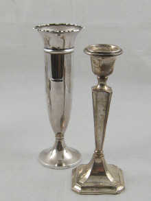 A silver vase 19 cm high (loaded)
