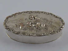 An oval silver trinket box Chester 1903