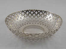 An open circular pierced silver