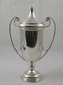 A tall hallmarked silver challenge cup