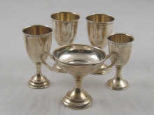 Four small goblets and a small