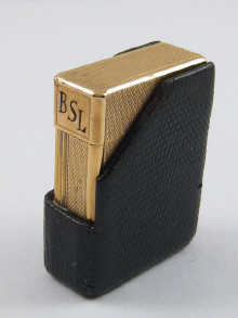 A gold plated Dupont gas lighter in