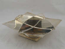 A silver four division square cake 149b28