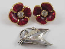 A pair of costume earrings by Christian