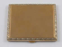 A 9 ct two colour gold cigarette case