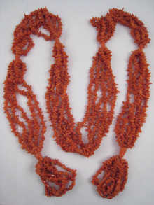 A Georgian coral sautoir with acorn