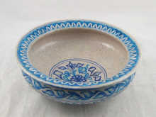 A ceramic bowl with underglaze blue