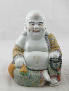 A finely enamelled ceramic figure 149ba2