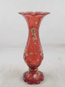 A Bohemian ruby glass vase decorated