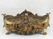 A gilt bronze oval French rococo