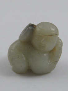 A Chinese jade carving of a boy 3.5
