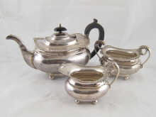 A three piece silver teaset of