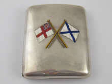 A silver presentation cigarette case