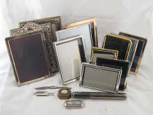 Five modern silver photo frames