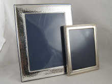 A large modern silver photo frame