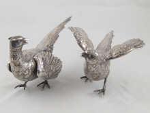 A pair of silver pheasants length