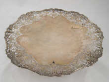 A footed silver cake dish with 149c3c