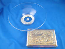 A clear glass bowl with silver mounted