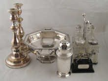 Silver plate. A pair of candlesticks