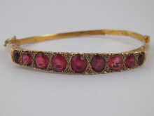 A 9 carat gold gem set bangle circa 149c6d